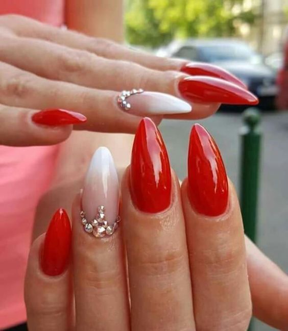 red nails with delicate floral design ...