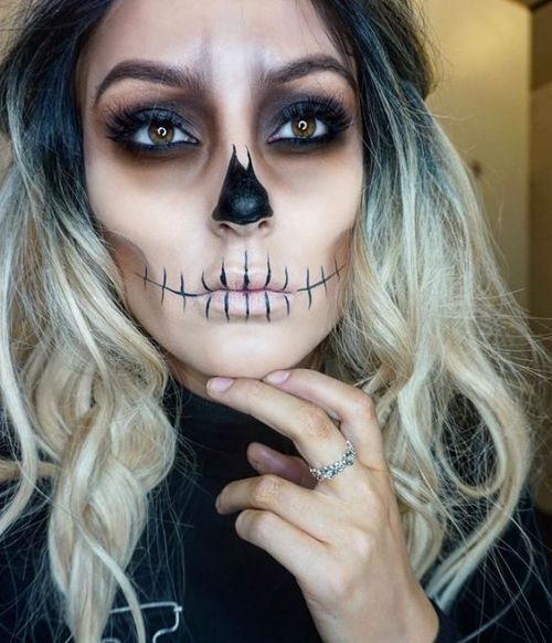 Half skull Halloween makeup